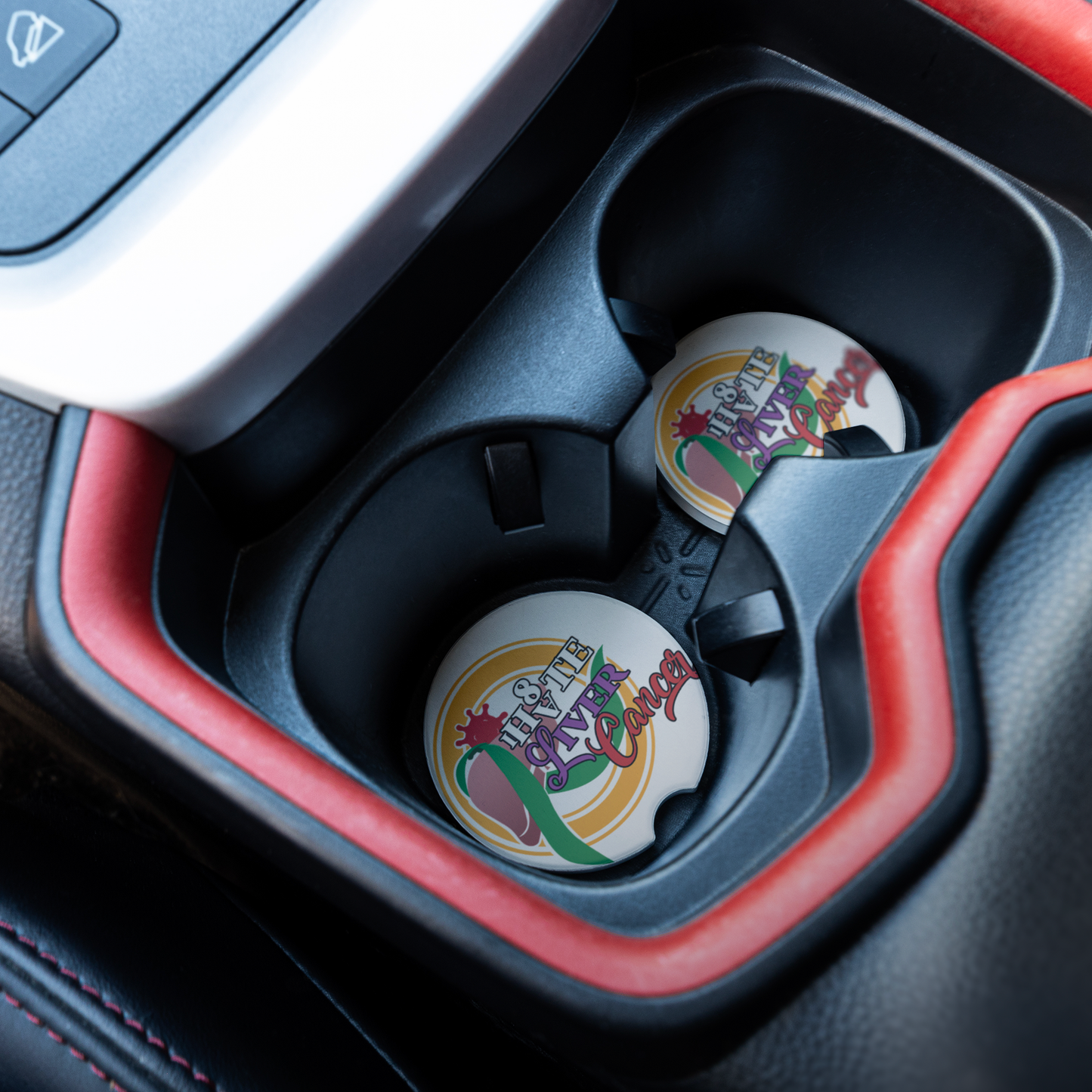 Liver_Cancer_Awareness_Coaster_CarCoaster_CarInterior_Angle_Mockup.png