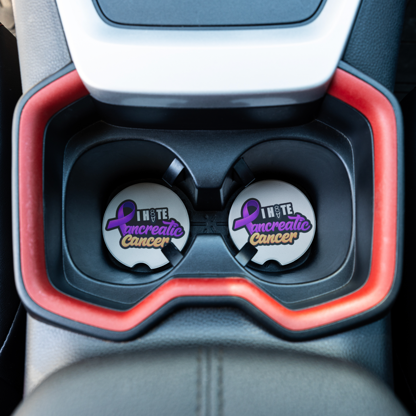 Pancreatic_Cancer_Awareness_Coaster_CarCoaster_CarInterior_Overhead_Mockup.png
