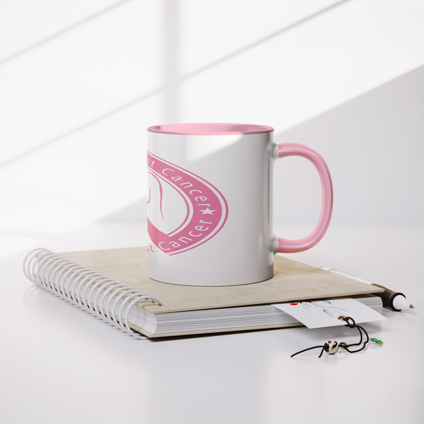 Breast_Cancer_Awareness_11oz_Mug_Lifestyle_Notebook_Mockup.png