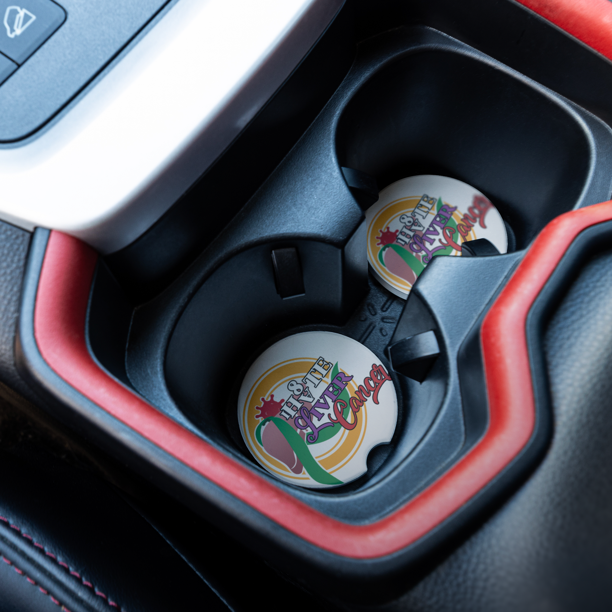 Liver_Cancer_Awareness_Coaster_CarCoaster_CarInterior_Angle_Mockup.png