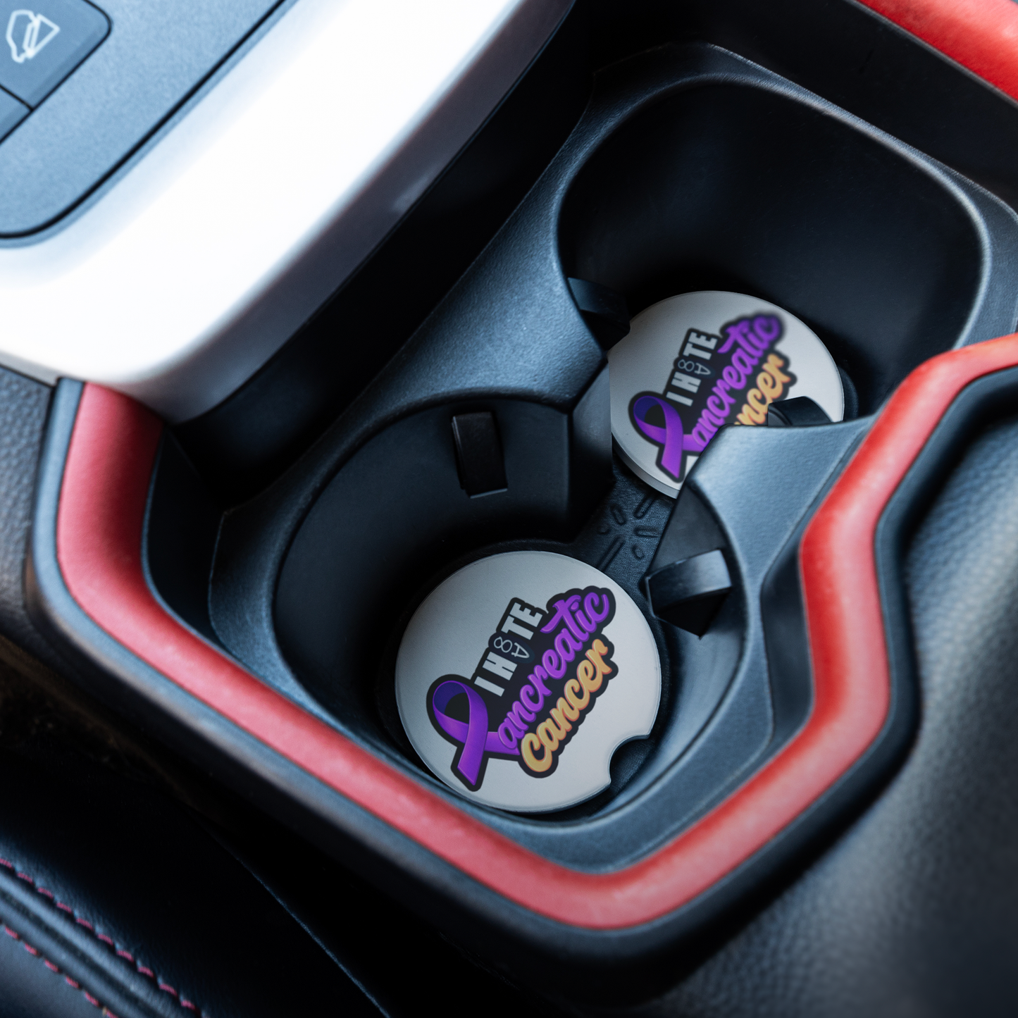 Pancreatic_Cancer_Awareness_Coaster_CarCoaster_CarInterior_Angle_Mockup.png